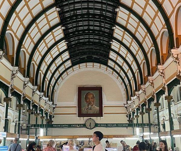 The post office’s iconic interior features high ceilings, marble floors, central clock